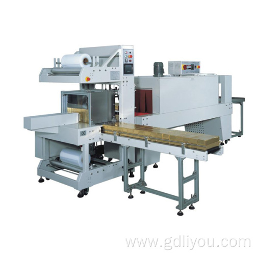 Cuff type automatic sealing shrink packaging machine